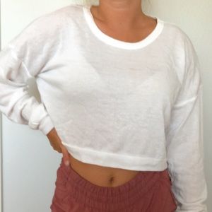 White open-back sweater